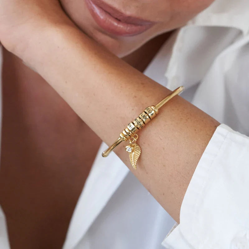 Pulseira Asas de Anjo Personalizável - Minha Familia - Gravação a Laser - Banhado a Ouro